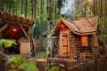 Big house made of logs in the forest. 