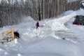 Snow blowing the road and house site